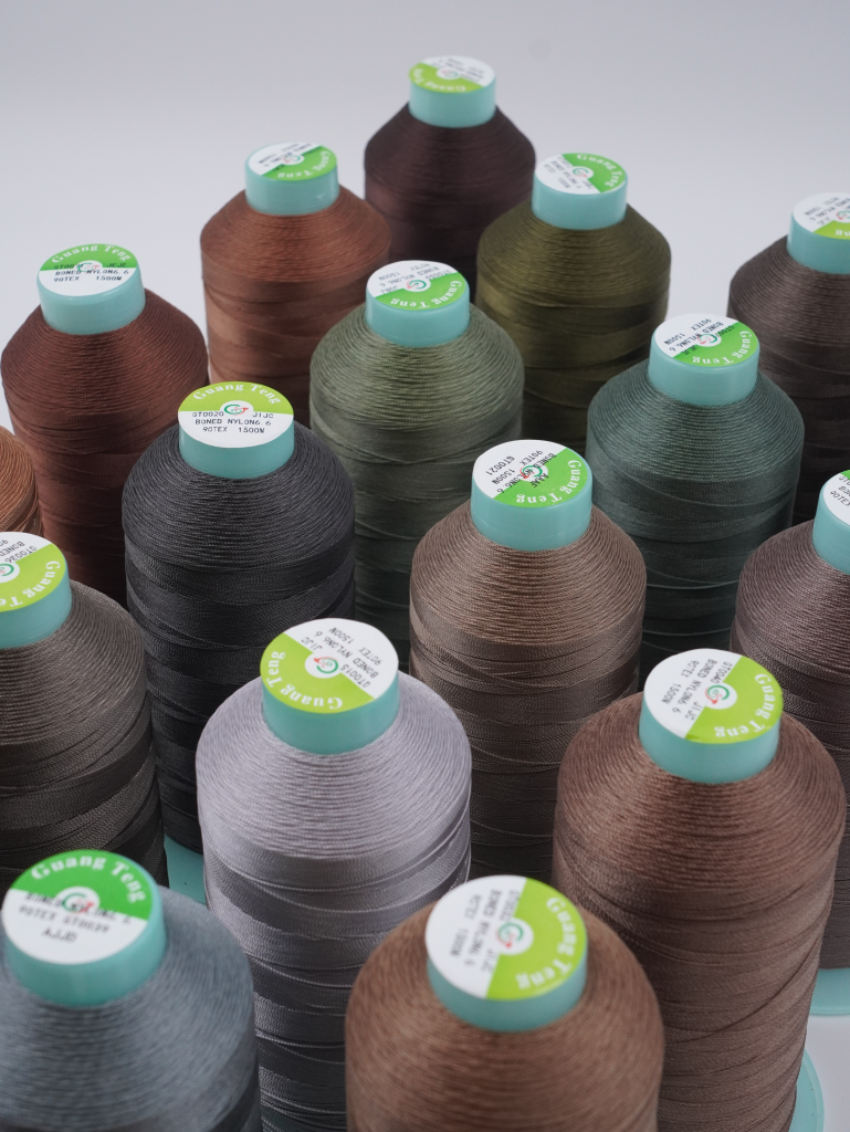 Bonded nylon 92 sewing thread for durable leather and upholstery stitching.