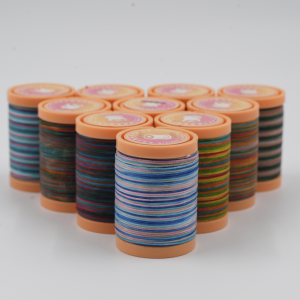 Rainbow colored flat wax thread for leather crafting” “Flat waxed polyester thread close-up” “Leather stitching with multicolor flat wax thread” “Durable waxed thread in rainbow colors for DIY crafts”