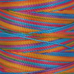 Close up of vibrant multicolored twisted cords tangled together