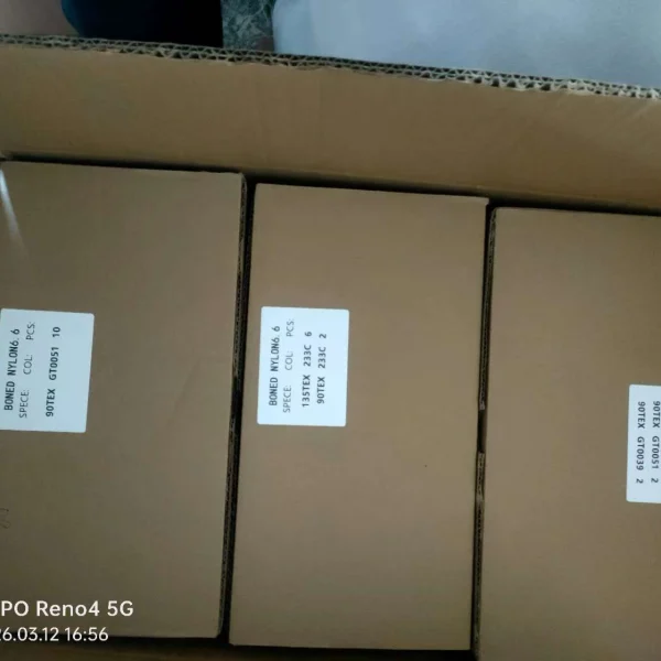 Industrial-grade vacuum sealed packaging for bonded nylon thread.